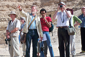 Galal Alsenusy, Barry Kemp group members looking across Amarna plain